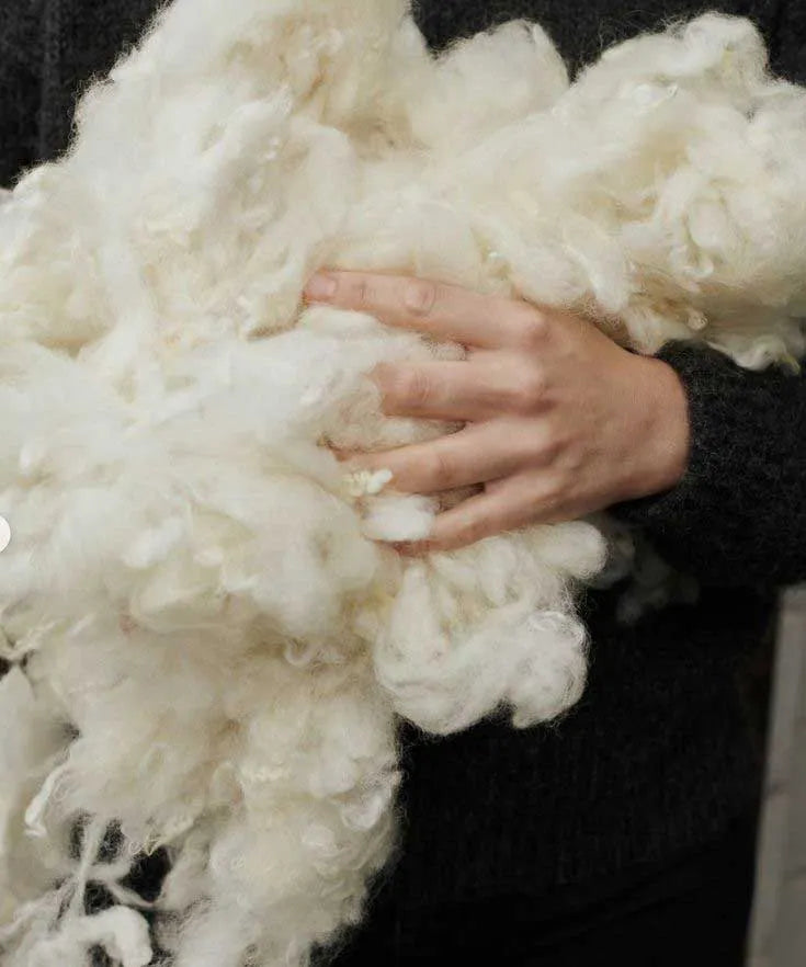 Cashmere fibre collection process highlighting the natural origins of luxury Pashmina and cashmere craftsmanship at Cashmere Knot Ireland